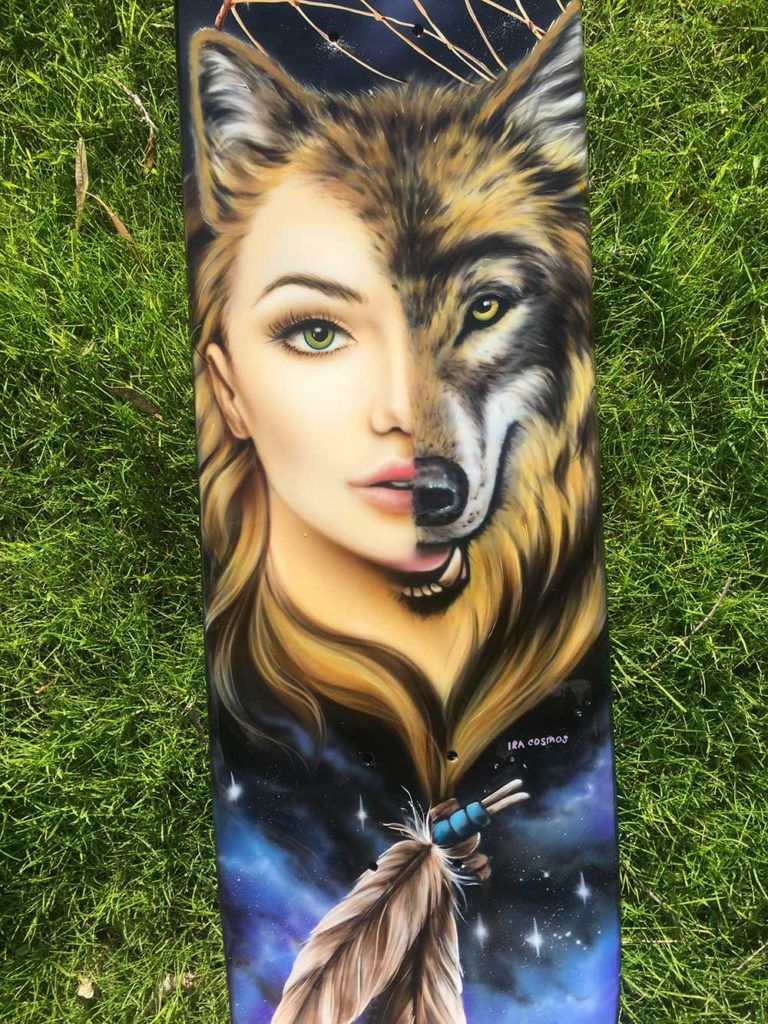 airbrushed skateboard art by Ira Cosmos