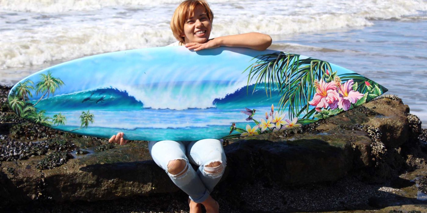 airbrushed surfboard by Ira Cosmos